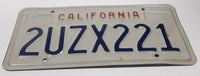 1990-95 California in Red on White with Blue Letters Vehicle License Plate 2UZX221