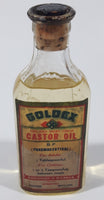 Antique Robinson & Webber Limited Winnipeg Packers Bottlers B.P. Pharmaceutical Goldex Gold Pure Cold Drawn London Castor Oil 4 1/2" Tall Glass Bottle with Cork Still FULL