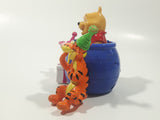 2007 DecoPac Disney Winnie The Pooh Pop Up in Purple Honey Pot Barrel with Tigger and Piglet 3 3/4" Tall Plastic Toy Figure Cake Topper