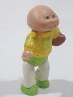 Vintage 1984 OAA Cabbage Patch Kids #55 Football Player in Yellow Green White 3 3/8" Tall Toy Figure