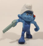 2011 Peyo "Carpenter" Smurf Holding a Saw with a Pencil in His Ear PVC Toy Figure McDonald's Happy Meal