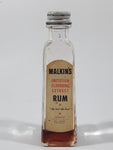 Vintage Malkin's Imitation Flavoring Extract Rum bottle from W.H. Malkin Ltd. of Vancouver, BC