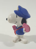 United Features Syndicate Peanuts Valentine's Day Mailman Snoopy Holding Pink Heart Shaped Letter 2 1/2" Tall PVC Toy Figure