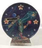 Vintage Banco Comercial Mexicano, S.A. Institucion De Deposito, Ahorro Y Fideicomiso Retro Space Age Cartoon Family and Robot Graphics with Rear Clock Hands 7 1/2" Tall Tin Metal Combination Coin Bank Safe Vault
