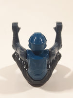 Blue and Grey Character with Helmet In Riding Pose With Arms Up 2 1/2" Tall Plastic Toy Figure