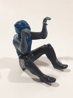 Blue and Grey Character with Helmet In Riding Pose With Arms Up 2 1/2" Tall Plastic Toy Figure