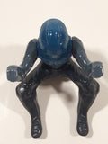 Blue and Grey Character with Helmet In Riding Pose With Arms Up 2 1/2" Tall Plastic Toy Figure