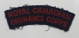 Royal Canadian Ordnance Corps 7/8" x 3 1/2" Arched Shoulder Title Fabric Patch Badge