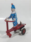 Vintage Roli Zoli Blue Clown with White Spots on Red Tricycle Bike 5 1/2" Tall Tin Metal Key Wind Up Toy Made in China