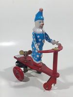 Vintage Roli Zoli Blue Clown with White Spots on Red Tricycle Bike 5 1/2" Tall Tin Metal Key Wind Up Toy Made in China