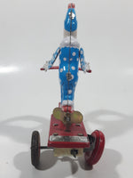 Vintage Roli Zoli Blue Clown with White Spots on Red Tricycle Bike 5 1/2" Tall Tin Metal Key Wind Up Toy Made in China