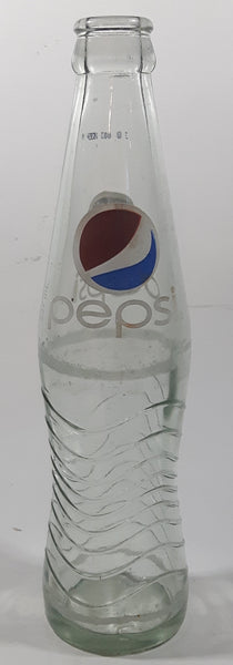Pepsi 8 3/4" Tall 237mL Embossed Clear Glass Soda Pop Bottle