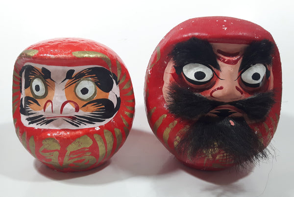 Pair of Japanese Paper Mache Daruma Dolls 5 1/4" Tall and 6 1/2" Tall