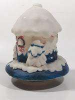 1998 Y. D. CO. Santa Claus White and Blue Snow Covered Round House 5 1/2" Tall Plastic Wind Up Rotating Musical Ornament