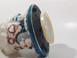 1998 Y. D. CO. Santa Claus White and Blue Snow Covered Round House 5 1/2" Tall Plastic Wind Up Rotating Musical Ornament