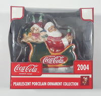 2004 Coca Cola Pearlescent Porcelain Ornament Collection Santa Claus in Sleigh Christmas Tree Ornament New in Box