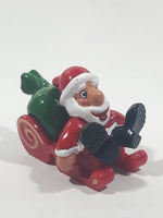 Santa Claus On His Sled with Bag of Presents 2 5/8" Long Toy Figure