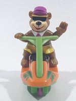 1991 McDonald's Hanna Barbera Yogi Bear Cartoon Character on Jet Ski Rev-Up and Go Toy Figure