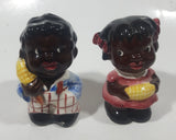 Rare Antique Black Americana Boy and Girl Holding Corn Cobs Cork Plug Ceramic Salt and Pepper Shakers