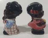 Rare Antique Black Americana Boy and Girl Holding Corn Cobs Cork Plug Ceramic Salt and Pepper Shakers