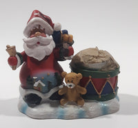 Santa Claus with Teddy Bear and Drum 3 1/4" Tall Resin Candle Holder