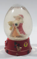 Santa Claus 4 1/4" Tall Red Resin Snow Globe