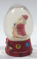 Santa Claus 4 1/4" Tall Red Resin Snow Globe