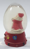 Santa Claus 4 1/4" Tall Red Resin Snow Globe