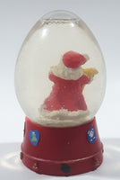 Santa Claus 4 1/4" Tall Red Resin Snow Globe