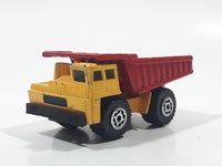 1992 Matchbox Faun Quarry Dump Truck Yellow and Red Die Cast Toy Car Vehicle