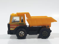 Vintage 1989 Buddy L Dump Truck Yellow Pressed Steel and Plastic Die Cast Toy Construction Equipment Vehicle