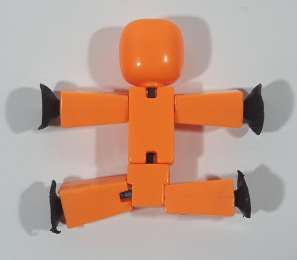 Orange 2 1/4" Tall Plastic Figure with Suction Cup Hands and Feet