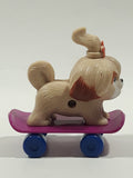 2019 McDonald's Secret Life Of Pets 2 Movie Daisy Dog On Skateboard 3 1/4" Tall Plastic Toy Figure