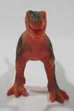 S.H. Orange and Green Raptor 2 3/4" Tall Dinosaur Toy Figure