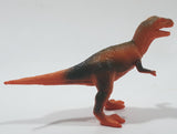 S.H. Orange and Green Raptor 2 3/4" Tall Dinosaur Toy Figure