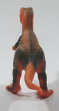 S.H. Orange and Green Raptor 2 3/4" Tall Dinosaur Toy Figure