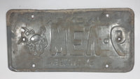 1989 1990 Yukon The Klondike Man Panning Gold Themed Yellow Metal Vehicle License Plate Tag WEV 6