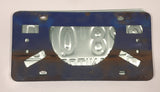 1997 Friendly Manitoba White With Black Letters Metal Vehicle License Plate Tag 228 QIA in Blue Cluthe Frame Holder
