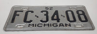 1952 Michigan Silver with Black Letters Metal Vehicle License Plate Tag FC 34 08