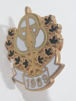 1989 Ultra Three Ring Black Enamel Maple Leaf Wreath Metal Lapel Pin