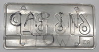 1983 Friendly Manitoba White With Black and Red Letters Metal Vehicle License Plate Tag 616 BLP