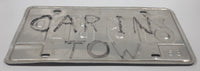 1983 Friendly Manitoba White With Black and Red Letters Metal Vehicle License Plate Tag 616 BLP