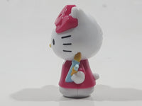 2018 Sanrio Hello Kitty with Paint Brushes 1 3/4" Tall Plastic Toy Figure