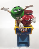 M & M's World Roller Coaster Ride Green and Red Character 10 1/2" Tall Plastic Candy Dispenser