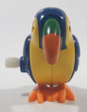 Hans Blue and Yellow Toucan Bird Wind Up 1 5/8" Tall Plastic Toy Figure