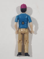 Nylint Driver Man in Blue Shirt Tan Pants and Purple Cap Hat 3 1/8" Tall Toy Action Figure