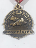 Canadian Outback Adventures Brass Medal Award with Red Ribbon