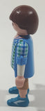 2012 Geobra Playmobil Man in Blue and Green Top with Tan Pants 2 3/4" Tall Toy Figure