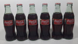 1996 Coca-Cola 1966 Season's Greetings Santa Claus Christmas 6-Pack of Full Never Opened 8 oz. Glass Bottles with Paper Carrier