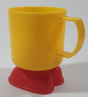 Vintage 1985 McDonald's Ronald McDonald Footed Yellow and Red Plastic Cup Mug with Feet